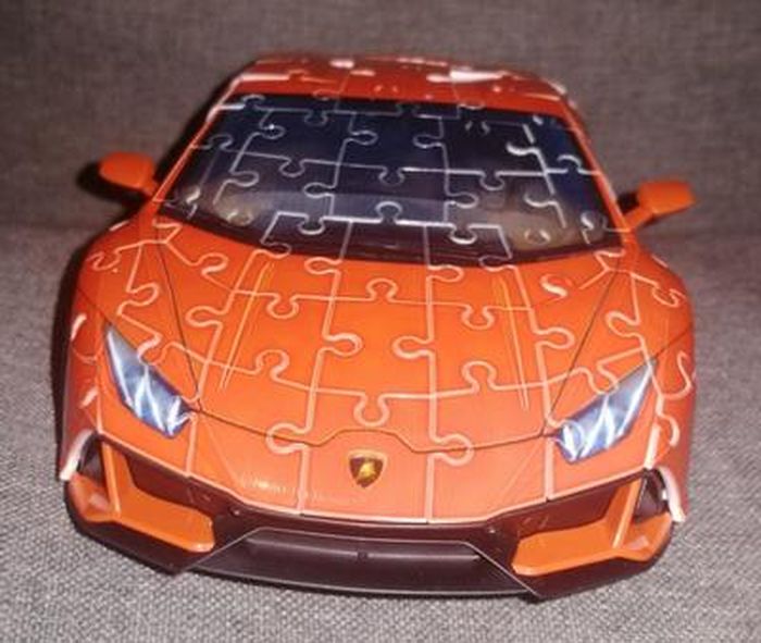Ravensburger - Puzzle 3D Véhicules - Lamborghini Huracan Evo, édition jaune  avec grille de construction - A partir de 8 ans - 108 pièces numérotées à  assembler sans colle - Accessoires inclus - 11562 : : Jeux et  Jouets
