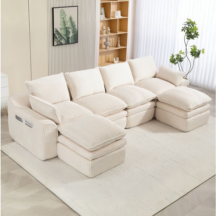 Canapé modulable 4 places avec 2 poufs velours côtelé beige coussins et poches latérales 335 x 167 x 85 cm