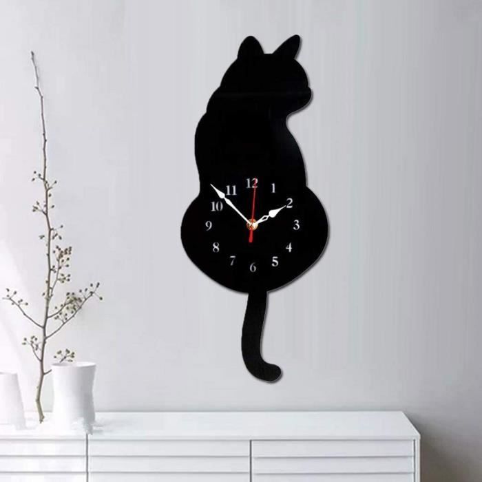 Horloge chat noir dos voûté câlin
