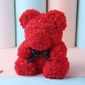 ours en peluche avec des roses
