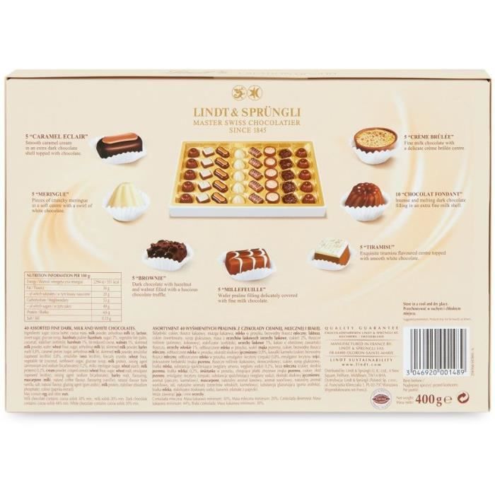 LINDT Création Dessert assortiment de chocolats au lait noirs et blancs  fourrés 451g pas cher 