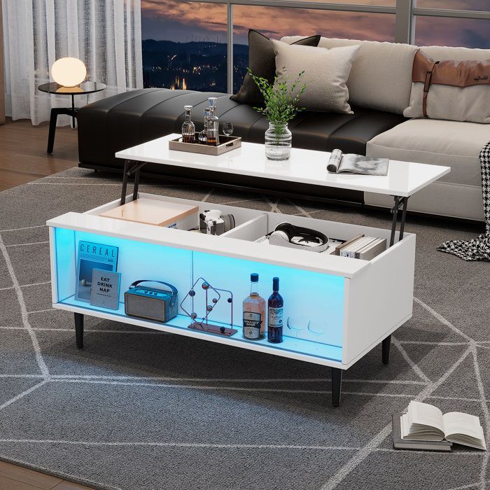 Table basse relevable - Dimensions 105x50x43 cm - Plateau relevable à 58 cm - Espace de rangement caché