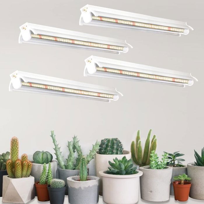 Un ensemble de 4 lampes de croissance LED blanches à spectre complet 5000K adaptées aux plantes dintérieur et aux semis.