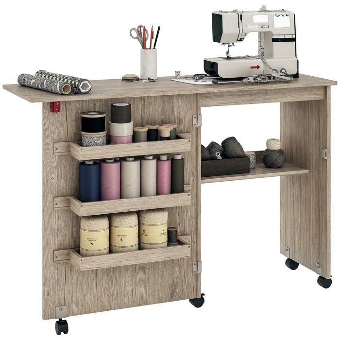 Table de couture pliante - HOMCOM - à abattant - bacs de rangement étagère ouverte et roulettes - 117x40x77 5cm - effet bois grisé Table de couture pliante - HOMCOM - à abattant - bacs de rangement étagère ouverte et roulettes - 117x40x77 5cm - effet bois grisé
