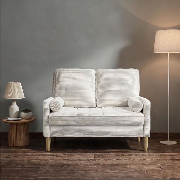 Pour petits espaces domestiques: canapé 2 places beige-toné velours côtelé style scandinave