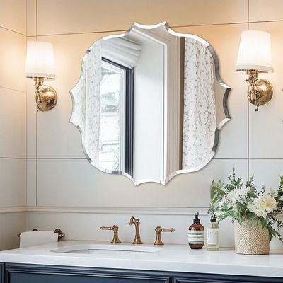 Miroir mural festonné élégant, oblong et biseauté, sans cadre