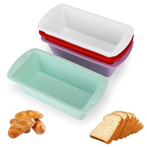 Lot De 2 Moules Silicone Tupperware Rectangulaires Avec Livre – Neuf