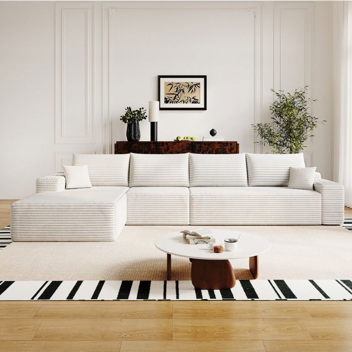 Canapé d’angle modulaire compressé 4 places 270 cm avec méridienne en L sans montage tissu blanc effet velours côtelé