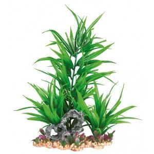 Plante plastique sur lit de gravier