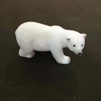 ourson marche a 4 pattes