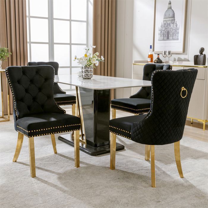 Chaise de salle à manger - Dossier à ailes - Velours noir - Pieds métal doré - Piquetage à boutons