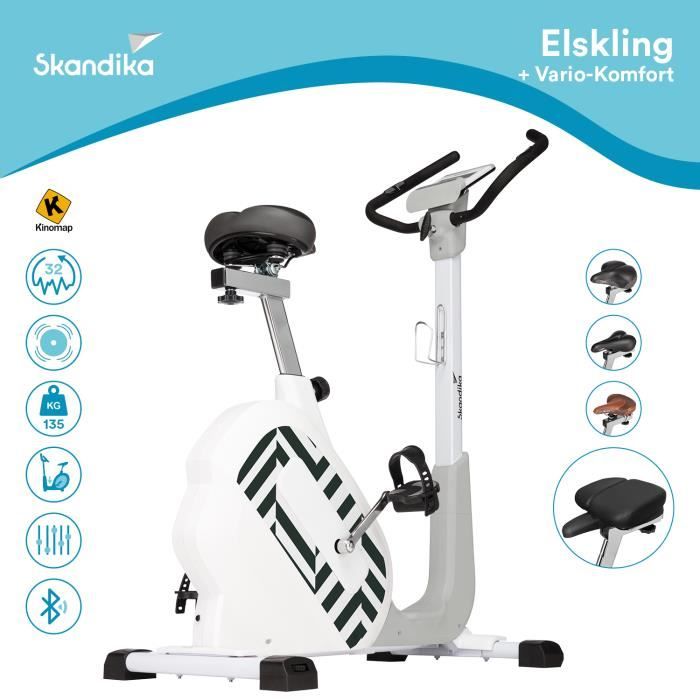 Skandika Elskling - Vélo d'appartement - Selle Vario Confort - 24 Prog. - 32 Niveaux de résistance - Frein magnétique - Inertie 11