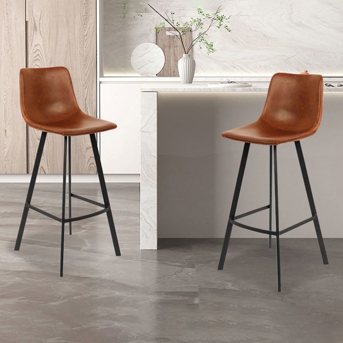 Cet Ensemble Comprend 2 Tabourets De Bar Avec Repose Pieds L Assise Hauteur 65 Cm Est Revetue De Similicuir De Couleur Cognac Cdiscount Maison