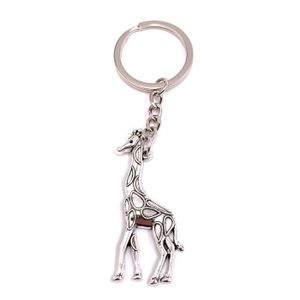 1 PORTE CLES GIRAFE 7 X 3.5 CM SILICONE JAUNE MODE