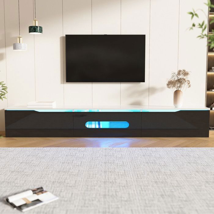 Meuble TV avec éclairage LED 180×35×30cm finition laquée brillante Meuble TV mural style minimaliste moderne noir et blanc.