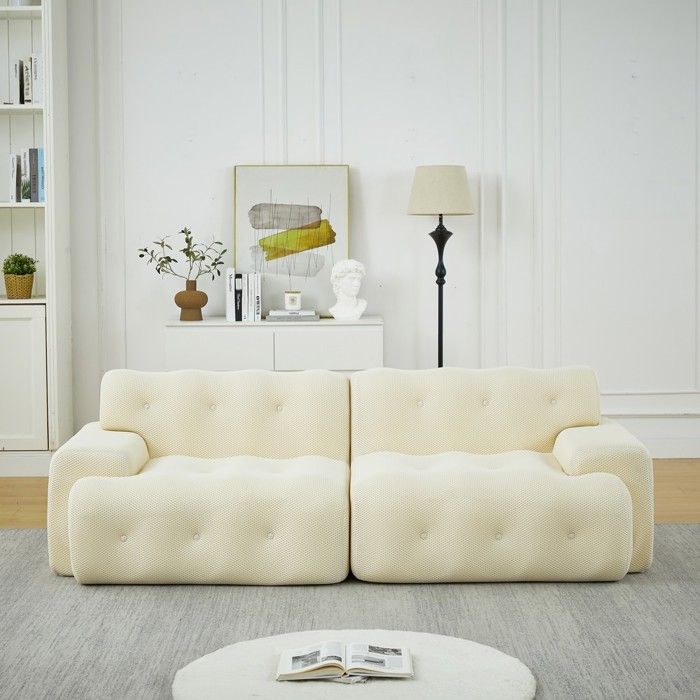 Canapé deux places - Cloud Sofa - Tissu beige - Capitonnage boutonné - Accoudoirs larges