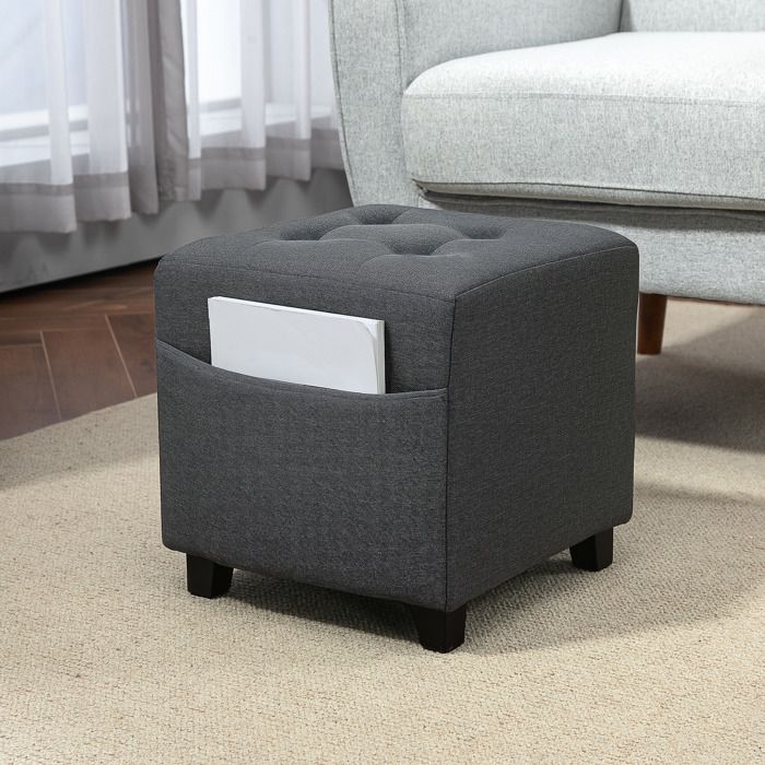 Repose-pieds de salon tabouret bas en lin gris poche latérale et couvercle capitonné à boutons