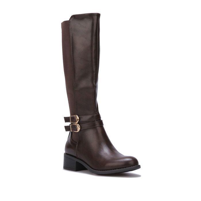 Bottes cavalières en simili avec empiècement élastique.Dotées de 2 brides avec boucles dorées.Présence dun zip sur le côté