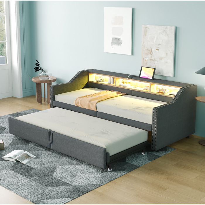 Canapé-lit rembourré convertible avec lit gigogne LED USB et rangements gris foncé