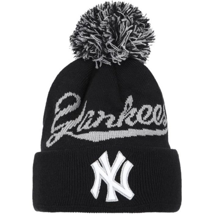 Bonnet tombant coloris gris doté d'un pom pom gris et noir. Gris