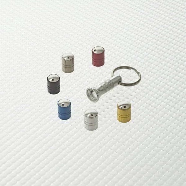 RICHBROOK kit de 4 Capuchons de valves antivol spinning + 1 clé - Gris argenté