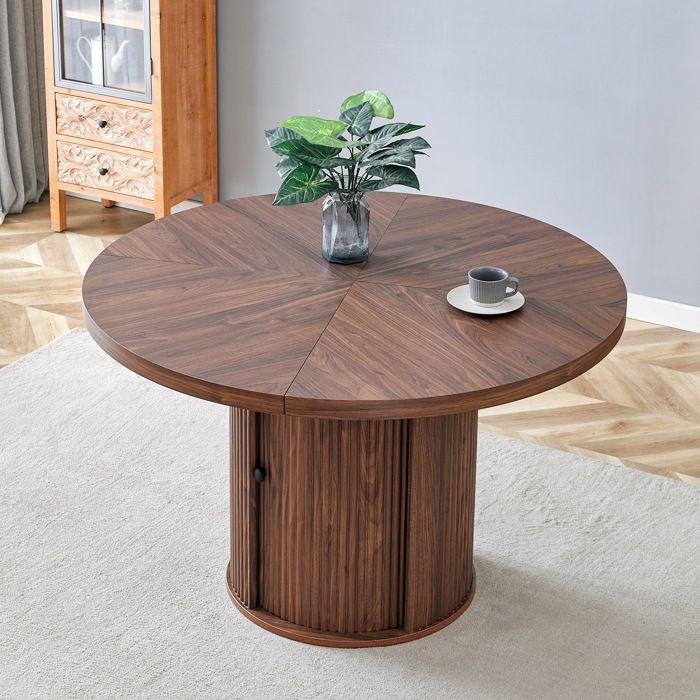Table à manger ronde 115 cm en MDF aspect noyer avec rangement intégré socle colonne 4 à 6 personnes
