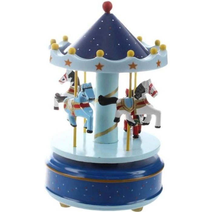 Petite boîte à musique carrousel bleu et rose avec trois chevaux en bois qui tournent à la mode idéale comme jouet ou cadeau de Noël.