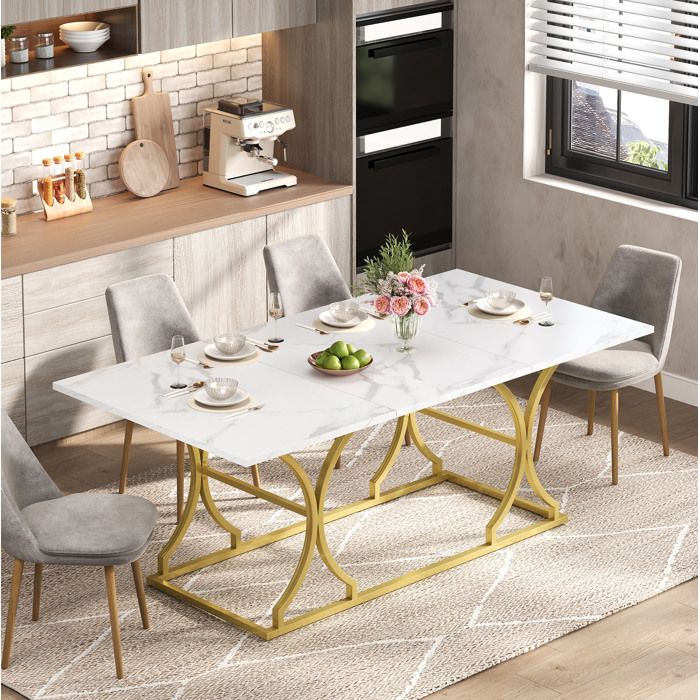 Table à manger effet marbre blanc et pieds métalliques dorés