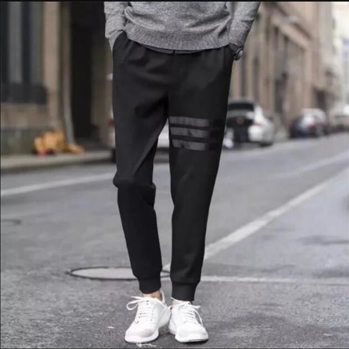 Pantalon de jogging pour homme ample et ray couleur unie noire