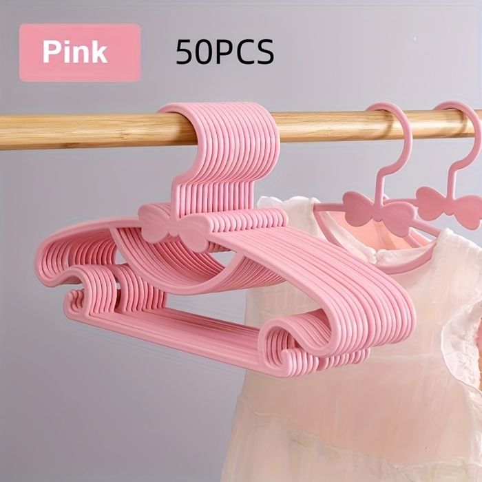 Cintres pour enfants - SAGRANDIR - Lot de 50 - Rose - Encoches antidérapantes - Empilables