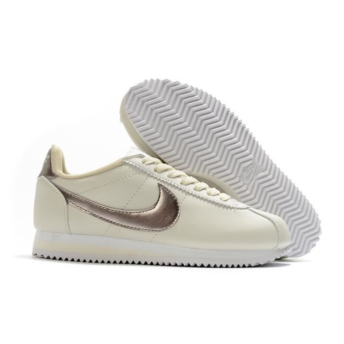 Nike cortez femme blanche et doré 2025