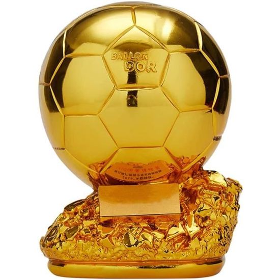 Un trophée doré brillant sur un fond en bois | Photo Gratuite