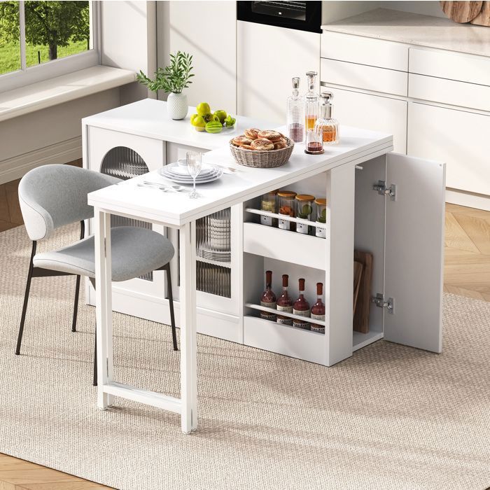 Îlot central extensible VUENOR - blanc pivotant 360° avec rangement et portes vitrées