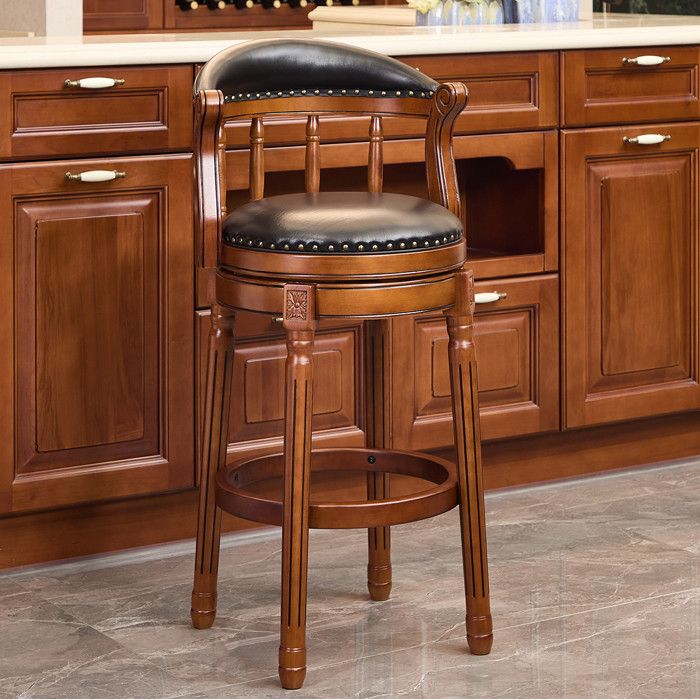 Tabouret de bar avec dossier structure bois et assise cuir aspect vache rotation 360°