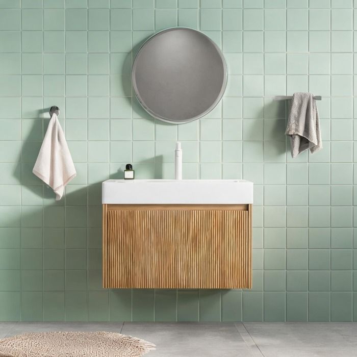 Meuble vasque suspendu 70 cm avec vasque intégrée en résine blanc brillant et façade bois naturel veiné