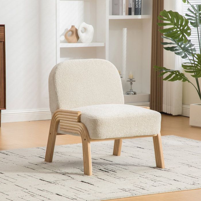 Fauteuil lounge scandinave en chenille beige structure en bois massif sans accoudoirs