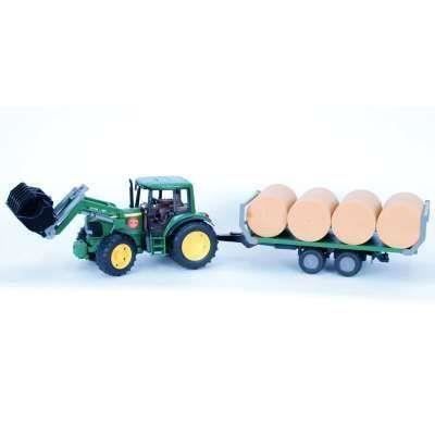 TRACTEUR JOHN DEERE AVEC FOURCHE ET REMORQUE A BALLES