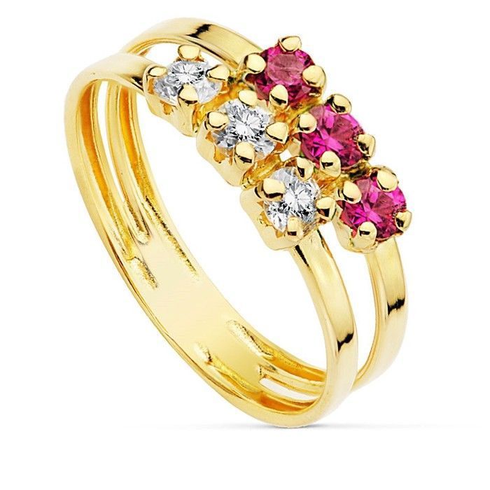 Bague en or 18 carats avec 3 pierres en oxyde de zirconium roses et 3 blanches serties griffes sur un anneau double.