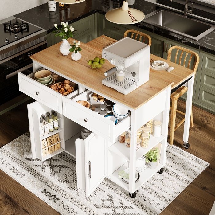 Îlot de cuisine mobile l135 x p44(70) x h90 cm, plateau pliable effet chêne, 2 portes, 3 tiroirs, porte-serviettes, 5 roulettes dont 2 avec freins, finition mélaminée Îlot de cuisine mobile l135 x p44(70) x h90 cm, plateau pliable effet chêne, 2 portes, 3 tiroirs, porte-serviettes, 5 roulettes dont 2 avec freins, finition mélaminée