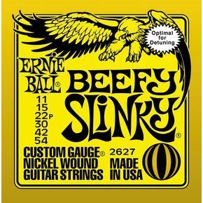 Cordes pour guitare électrique Ernie Ball Slinky 2627 Beefy Drop : Le secret pour un son puissant et précis