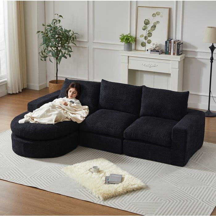 Canapé d’angle modulable AESVAR 3 places en chenille noire méridienne réversible sans montage