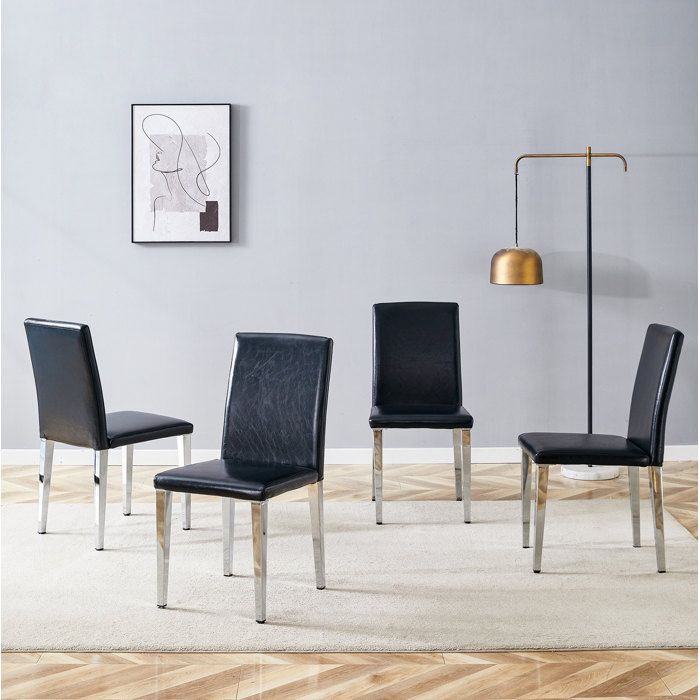 Modenuit Lot de 4 chaises de salle à manger en PU noir avec pieds en métal argenté design minimaliste H 90 cm