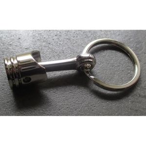Porte clé en métal piston moteur mécanique 
