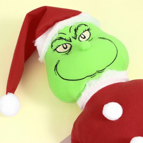 GRINCH COUSANT UN COSTUME DE PÈRE NOËL