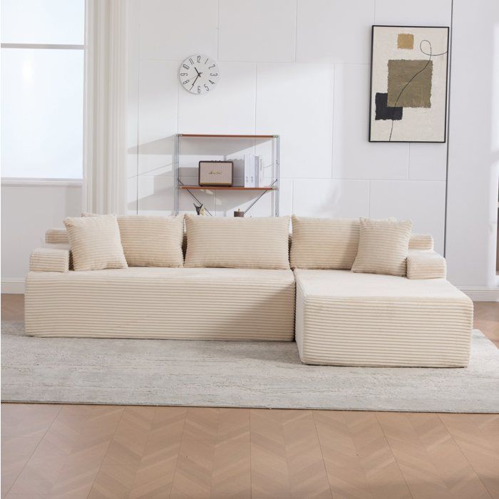 Canapé dangle modulable compressé en chenille beige 4 places livré monté