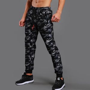 noir REDCAMP Pantalon imperm/éable unisexe pour homme et femme Pantalon de pluie l/éger avec jambe zipp/ée pour le camping la randonn/ée