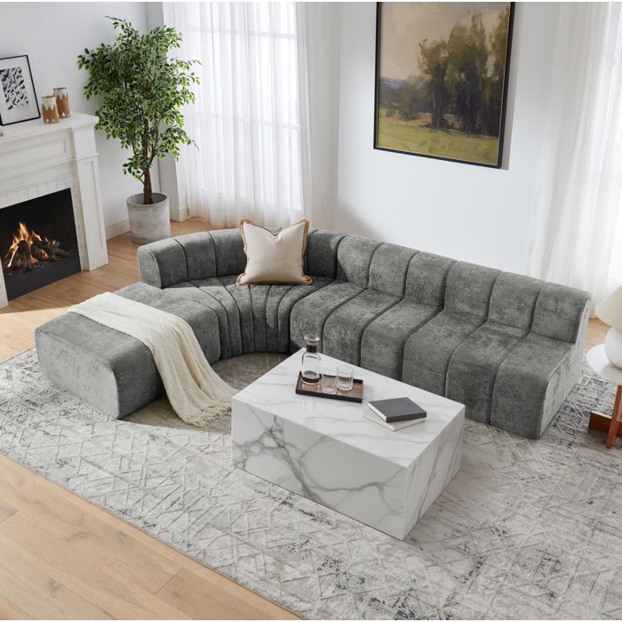 Canapé d’angle modulable 4 places EVRYAE 285 x 203 cm modules libres en chenille gris livré compressé en 3 colis
