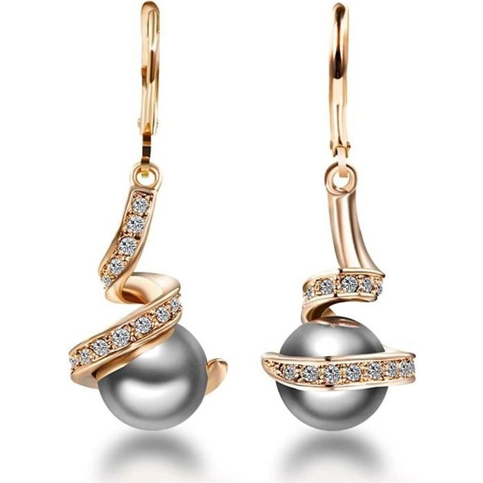 Boucles d\u2019oreilles pendantes dor\u00e9 \u00e0 l\u2019or fin et cuir vert \u00e9meraude .