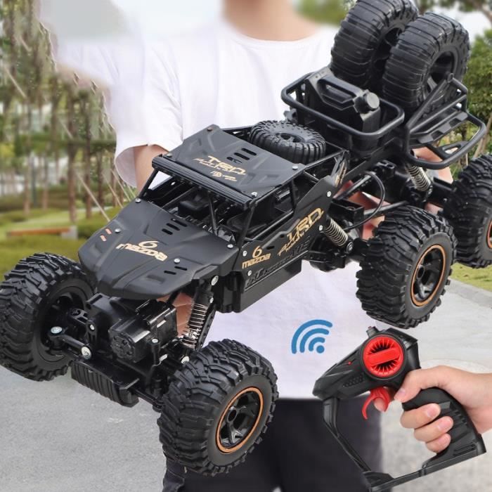 Mostop Camion Militaire RC 6WD 1/12 – 2 Batteries – 2,4 GHz – Jusqu’à 20 Km/h – Charge 1,5 Kg – Pneus Caoutchouc – Pour Enfant Et Adulte