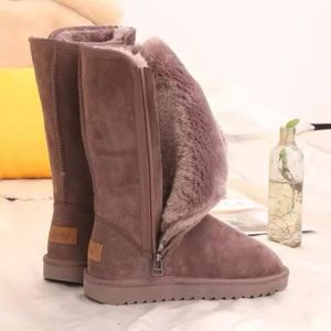 Bottes de neige hautes classiques pour femme avec nœud - Imperméables -  Doublure thermique respirante - Semelle antidérapante en caoutchouc - Cuir  daim véritable - Jaune - 39 : : Mode